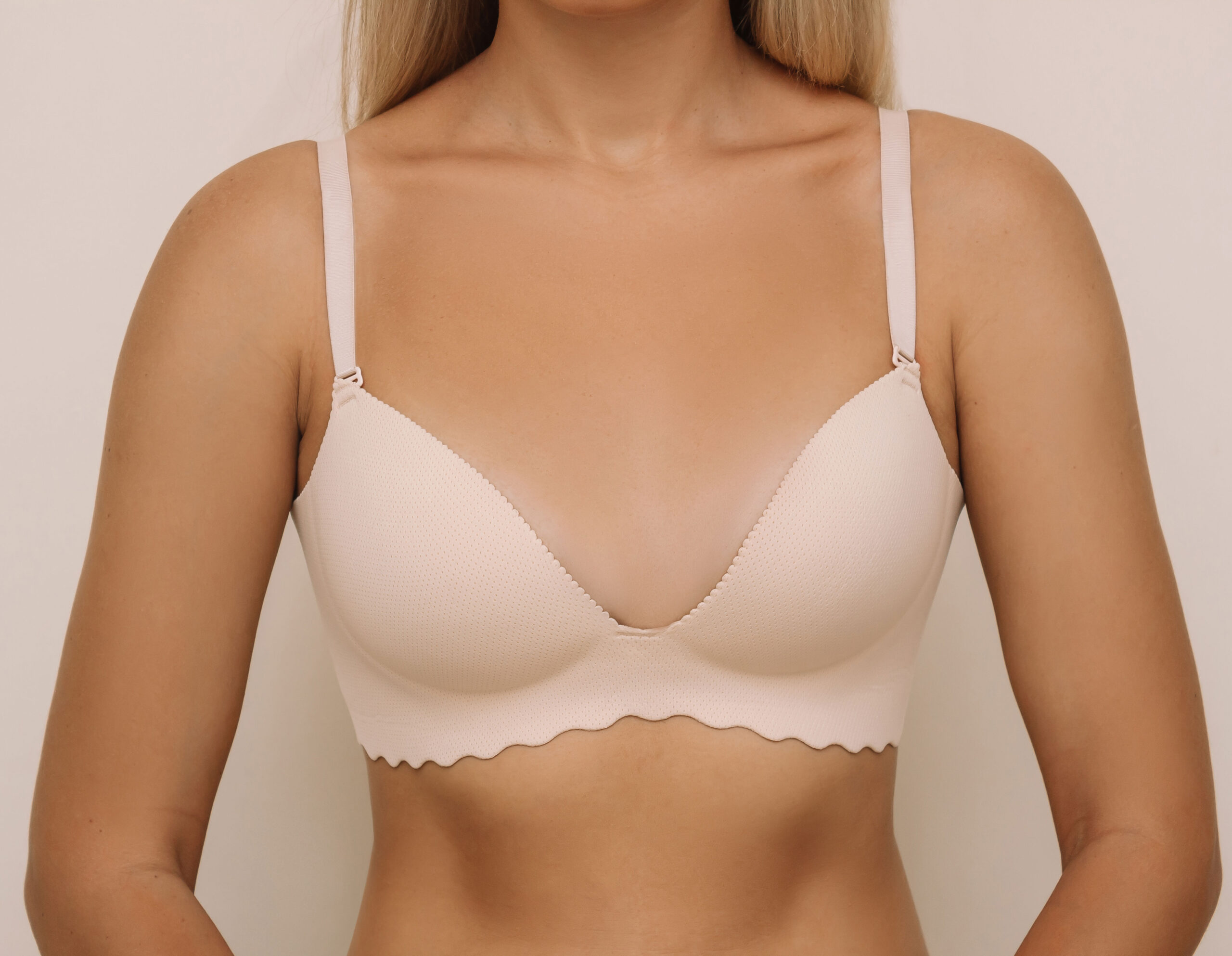 young-tanned-blonde-woman-bra-before-after-breast-augmentation-with-silicone-implants_407348-2425-Copia